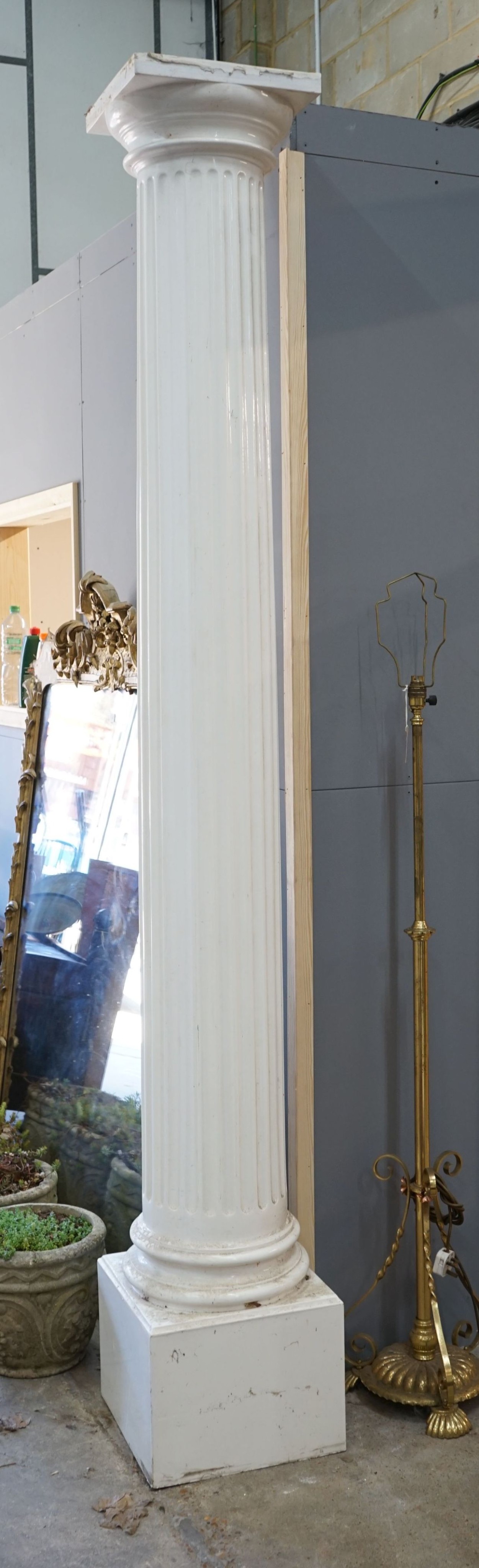 A pair of fibreglass fluted columns, height 246cm